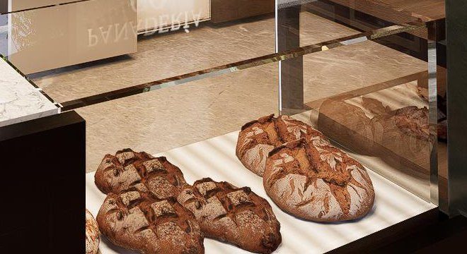 Hogaza de campo de masa madre en la vitrina de la panadería